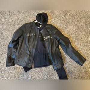 Women’s large Harley Davidson riding jacket.